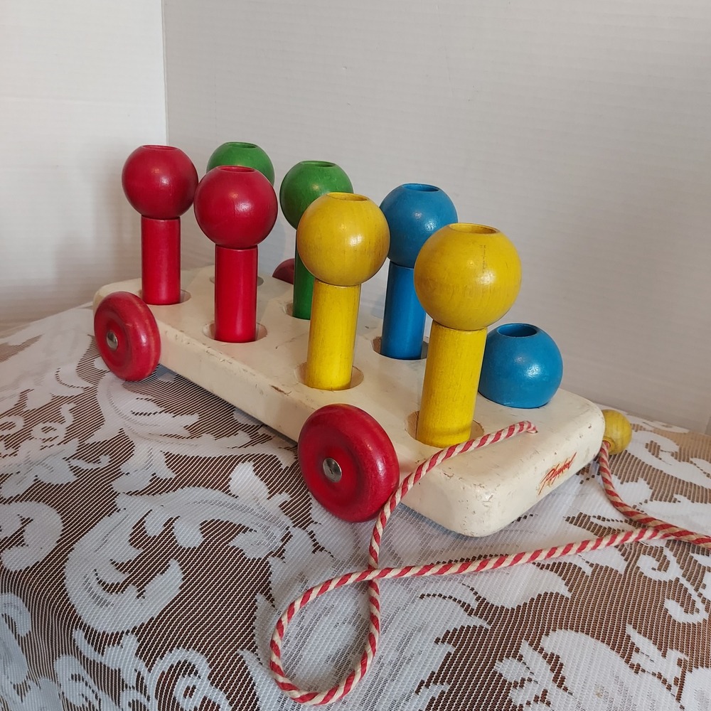 Vintage Playskool Wooden Pull Toy Peg Wagon Primary Colors 8 Pegs USA Made - Picture 1 of 6